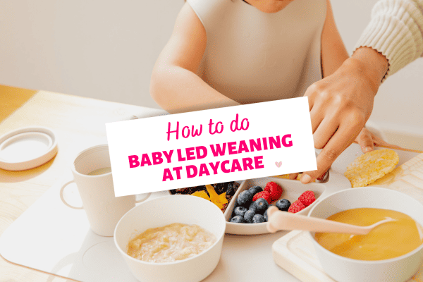 text states how to do baby led weaning at daycare, image of toddler with bib eating berries at daycare